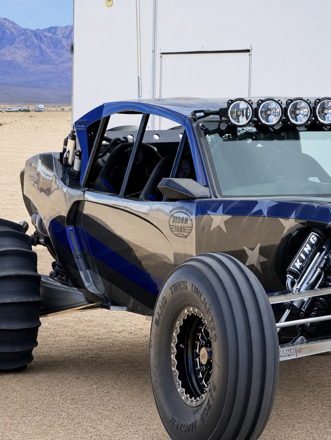 The Olson Iron custom blue sand rail at the dunes