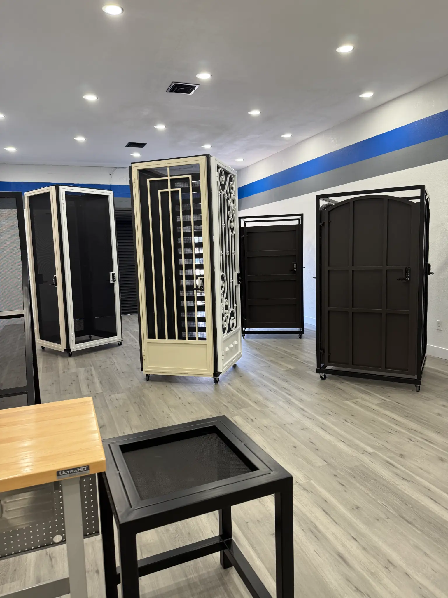 Security doors on wheeled stands in the Olson Iron Las Vegas showroom
