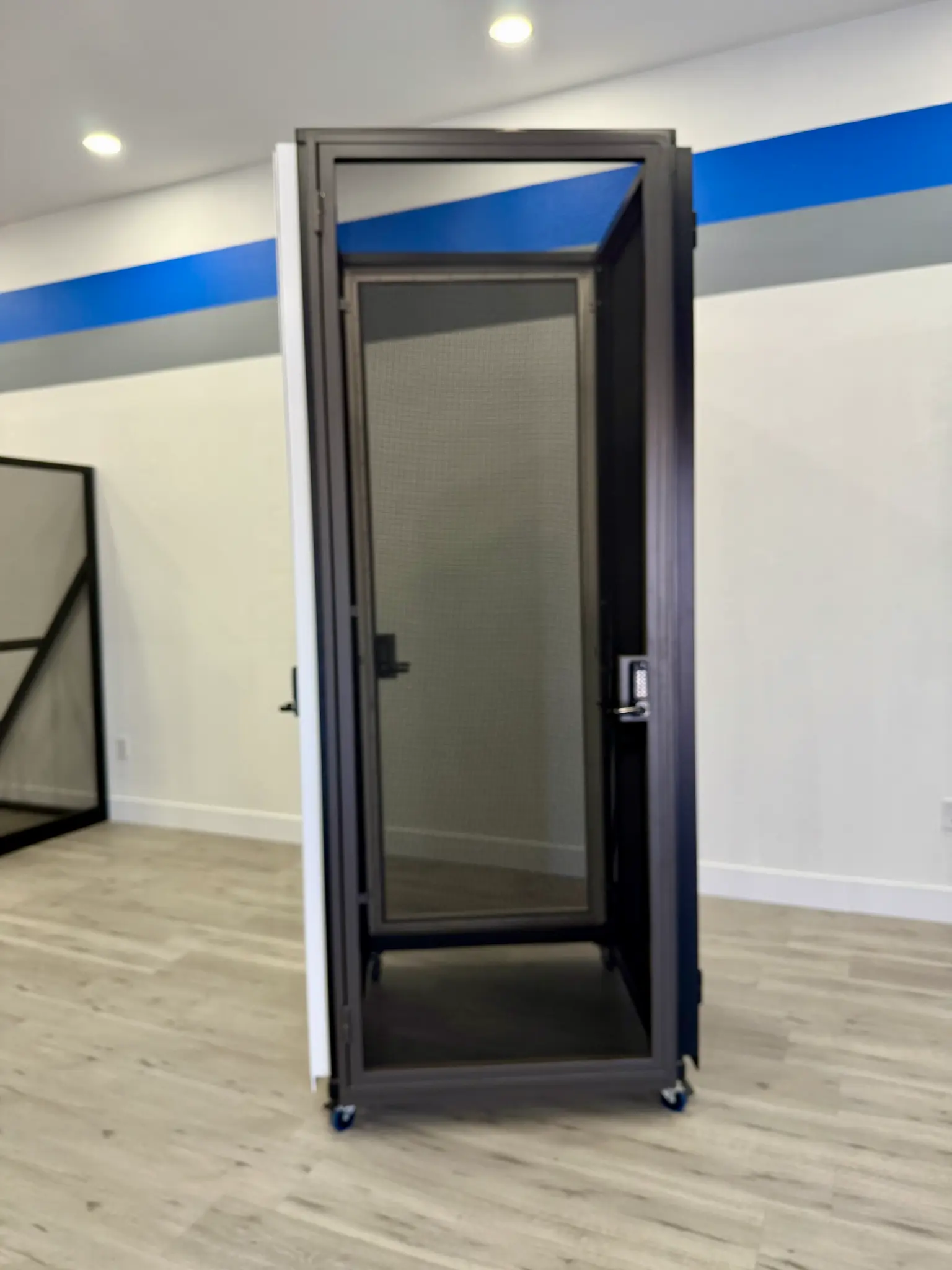 Olson Iron showroom interior overview with multiple products on display