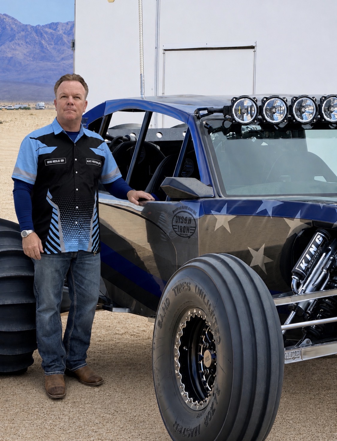 Bo Olson, President of Olson Iron Las Vegas, with the Olson Iron dune buggy