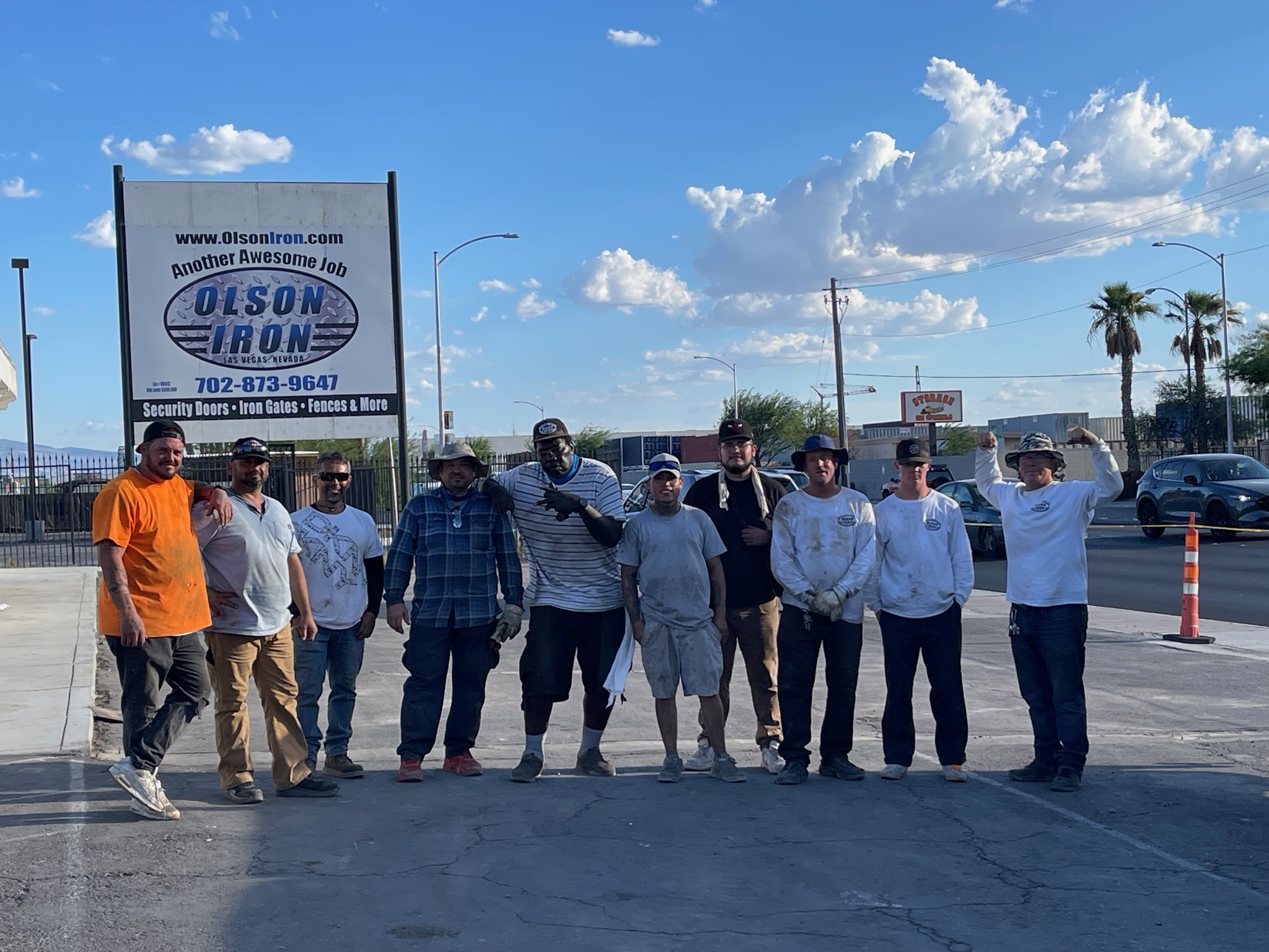 The Olson Iron crew in front of the Olson Iron Las Vegas sign