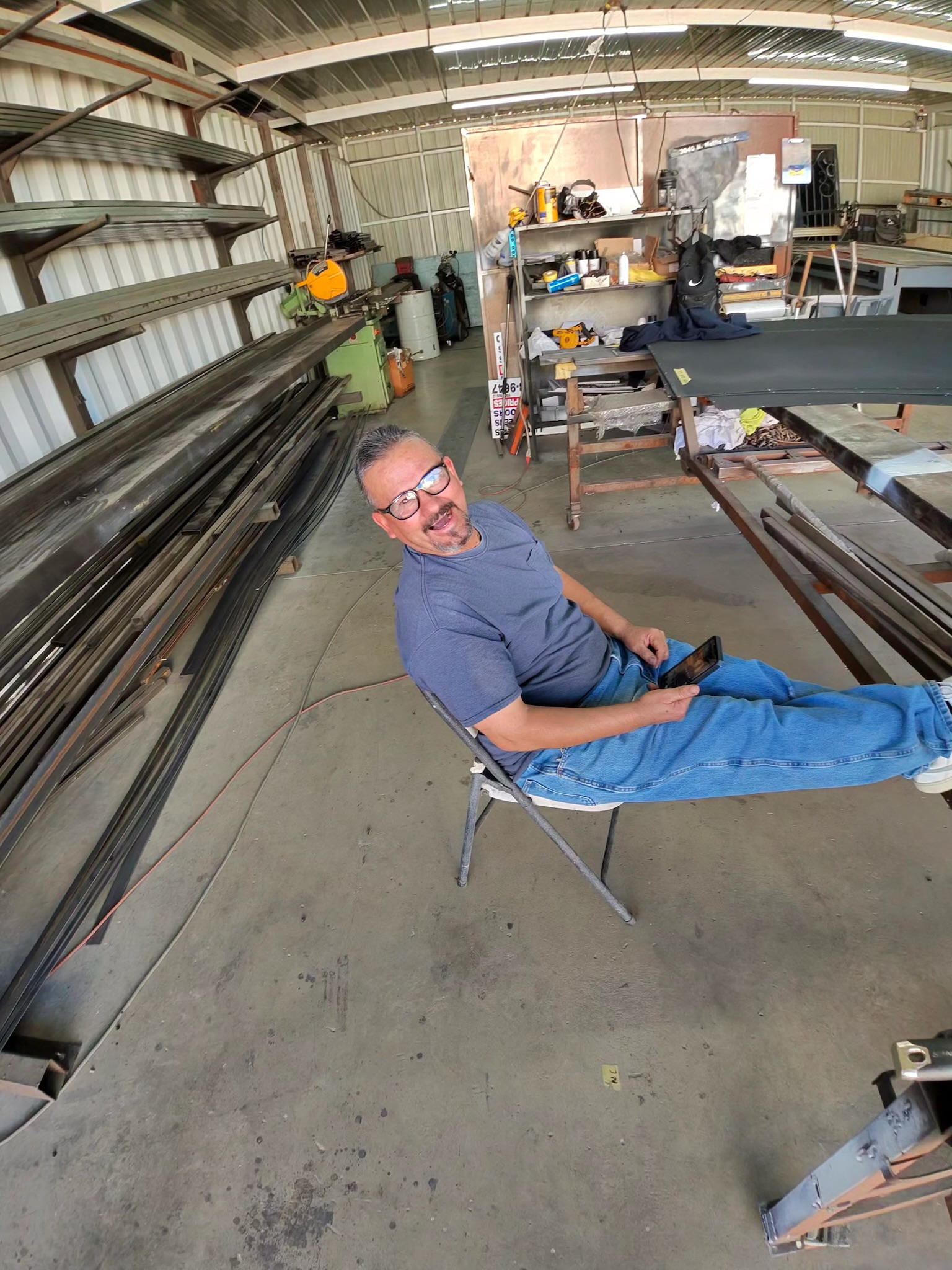 Esteban in the Olson Iron fabrication shop