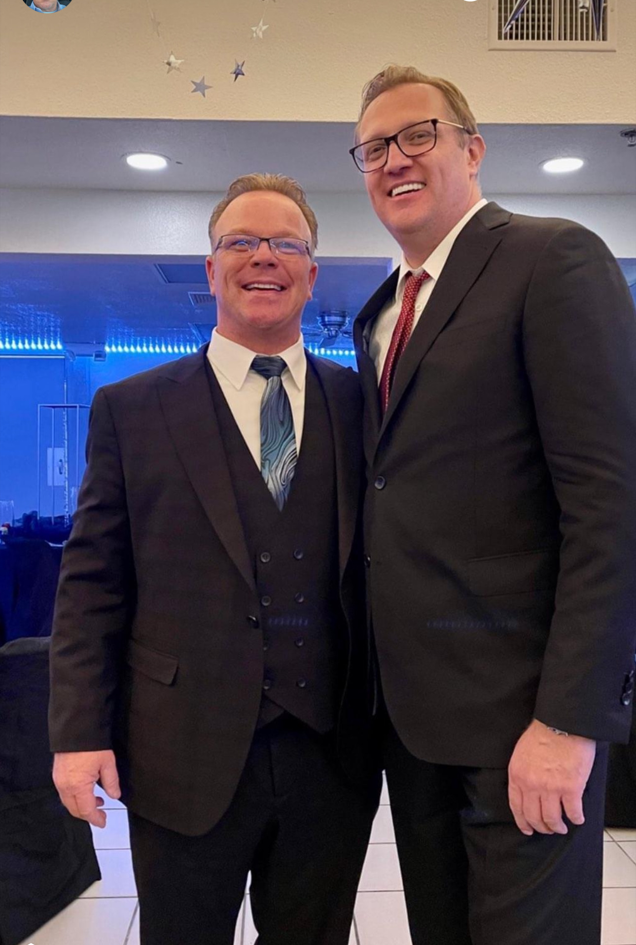 Bo Olson and Pastor Stoltzfus at a formal event