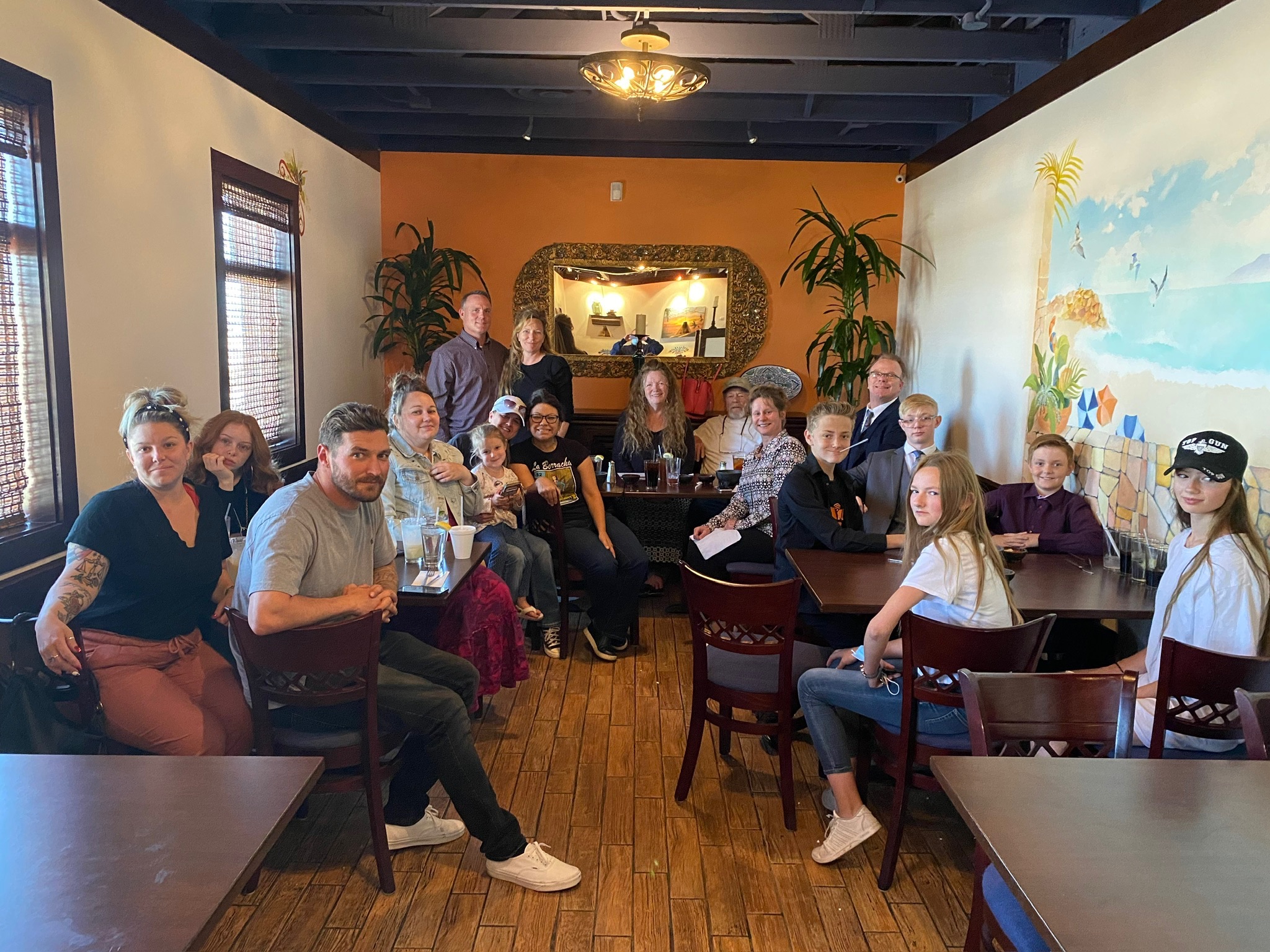 The Olson family gathered at a restaurant