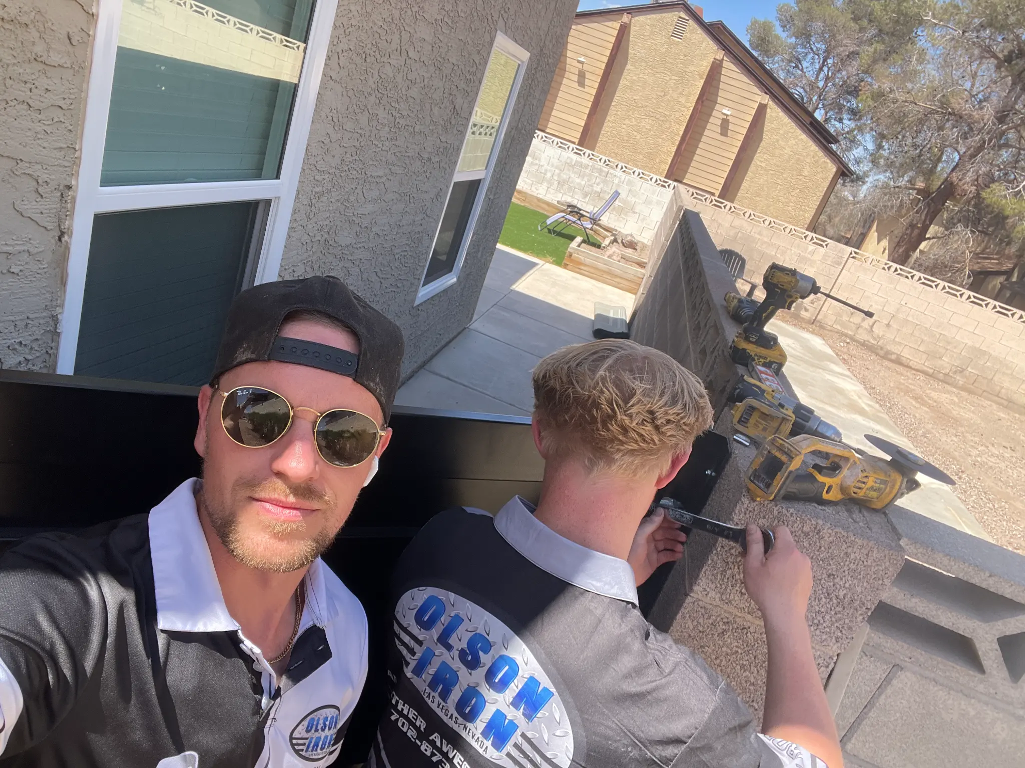 Jay and Shea selfie while installing ironwork on a Las Vegas residence